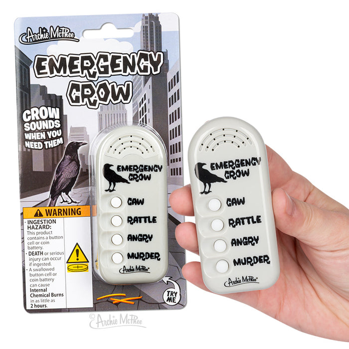 A hand holds an Emergency Crow, an electronic noisemaker equipped with buttons that produce crow sounds like caw, rattle, angry, and murder. This convenient device ensures seamless crow-munication in any situation.