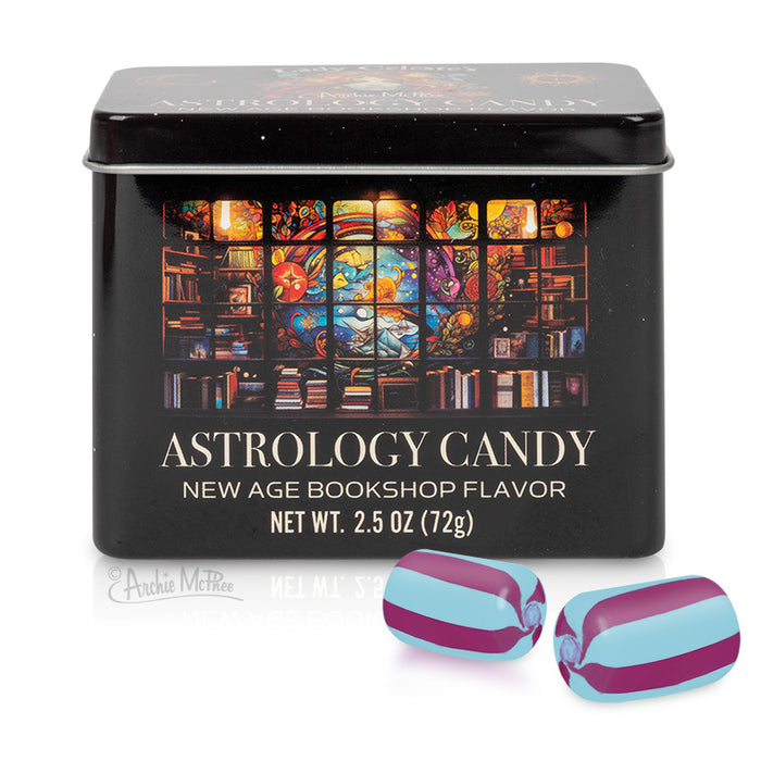 A tin of Astrology Candy in black features a vibrant bookshop design, accompanied by two individually wrapped candies. Ideal for fans of new age bookstores, this enchanting treat blends the allure of astrology with sweet enjoyment.