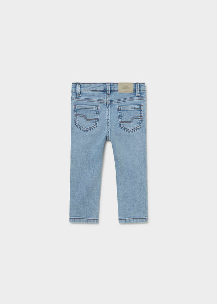 Back view of Mayoral baby slim fit jeans showing Light Blue denim wash and pocket details.