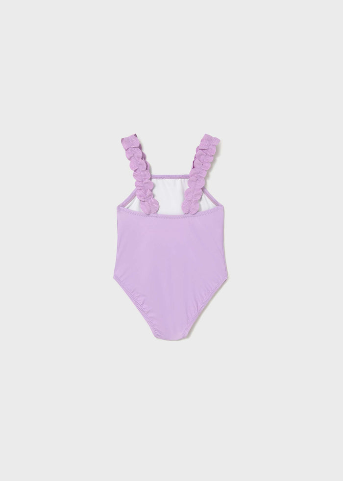 Back view of Mayoral baby girl Lilac one-piece swimsuit with stretch swim fabric.