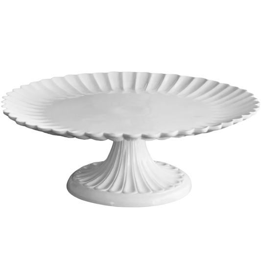 White decorative cake stand on a white background