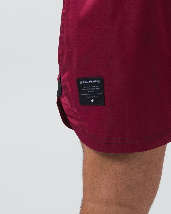 Kingz Born To Rule Shorts Maroon - Close-Up Side View Black Label Right Thigh Maroon Fabric Contrast Stitching KINGZ Kimonos Text Badge Grappling Shorts BJJ No-Gi Training [color:Black]