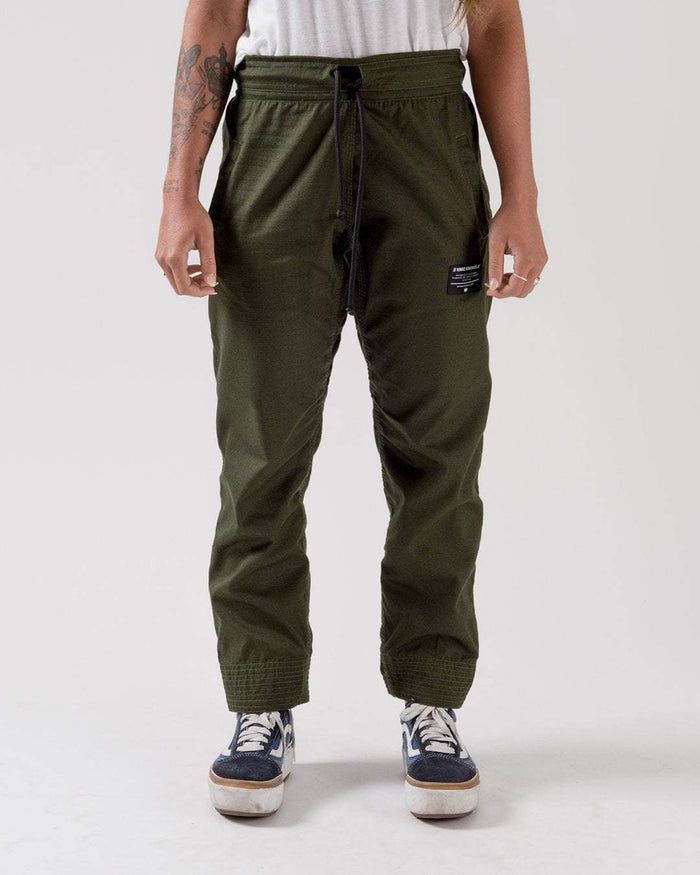 Kingz Casual Rip Stop Gi Pant Military Green - Front View Female Model Black Drawstring Elastic Waist Black Label Patch Durable Fabric BJJ Gi Training Apparel [color:Military Green]
