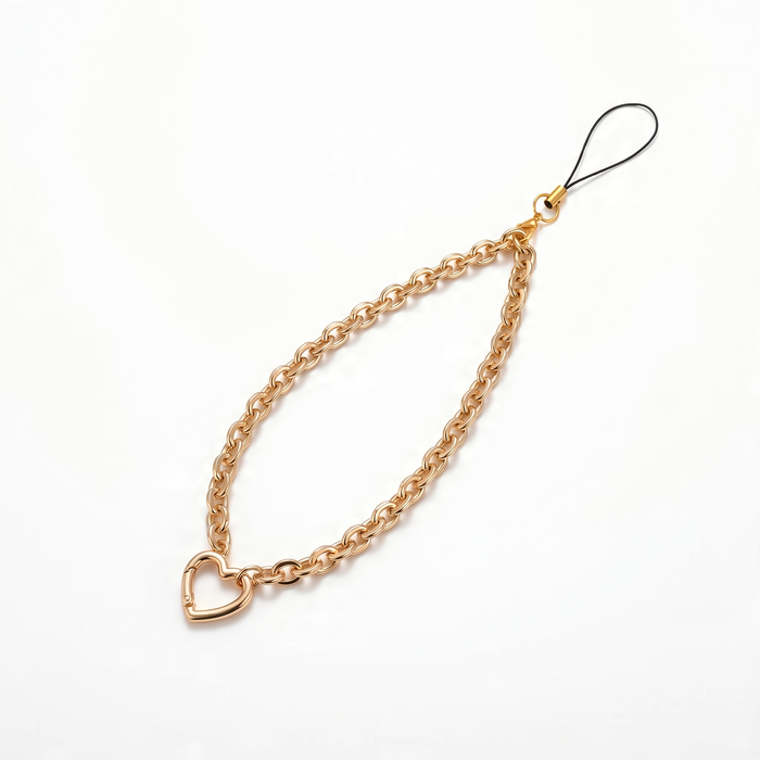 Gold chain with a heart-shaped clasp on a white background