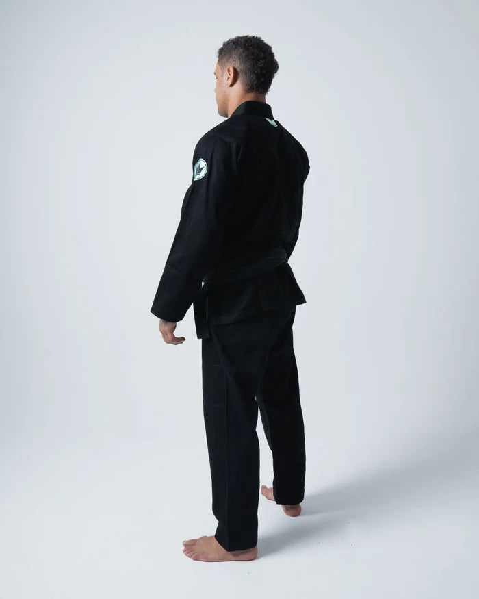 Kingz Classic 3.0 BJJ Gi Black - 3/4 Angle View Side Upper Body Detail Crown Shield Patch