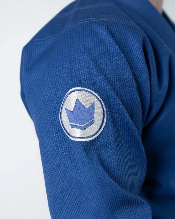 Kingz Classic 3.0 Jiu Jitsu Gi - Blue - Close-Up Detail View Sleeve White Crown Badge Textured Fabric Blue BJJ Kimono Training Gi [color:Blue]