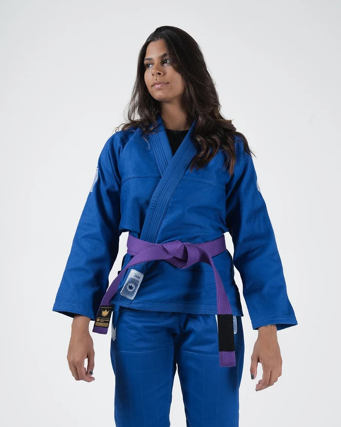 Kingz Classic 3.0 Women's BJJ Gi Blue - Upper Body Front View Female Athlete Purple Belt Crown Badge Logo KINGZ Label Women's