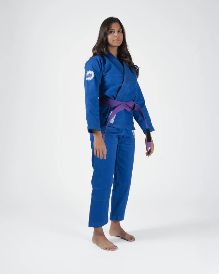 Kingz Classic 3.0 Women's BJJ Gi Blue - Full Body Angled Front View Female Athlete Purple Belt Crown Badge Logo Women's