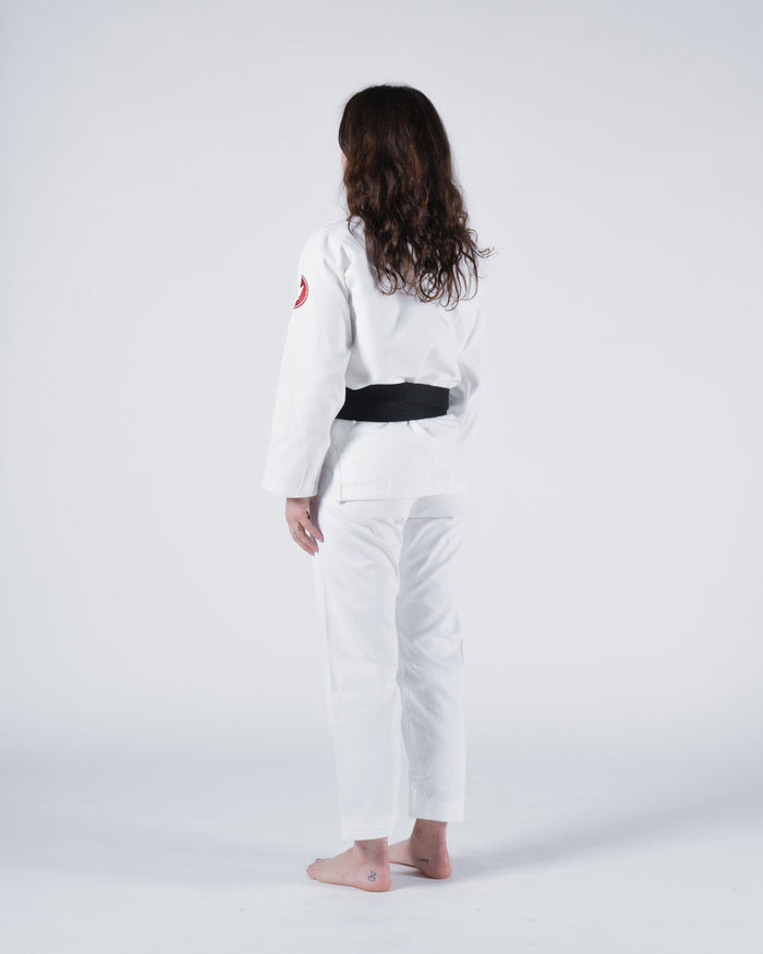 Kingz Classic 3.0 Women's BJJ Gi White - Full Body 3/4 Back View Female Athlete Black Belt Red Crown Badge Logo Sleeve Women's