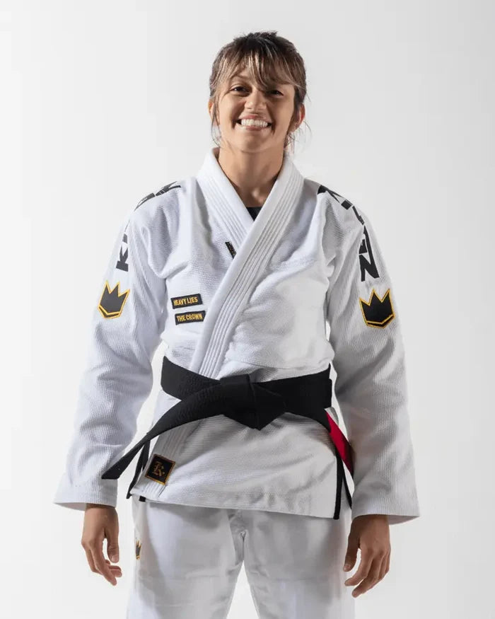 Kingz Comp 450 V6 Women's Gi - White - Front View Female Athlete Black Crown Shoulder Patches Yellow Trim Heavy Lies The Crown Text Black Belt White Fabric BJJ Gi Training [color:White]