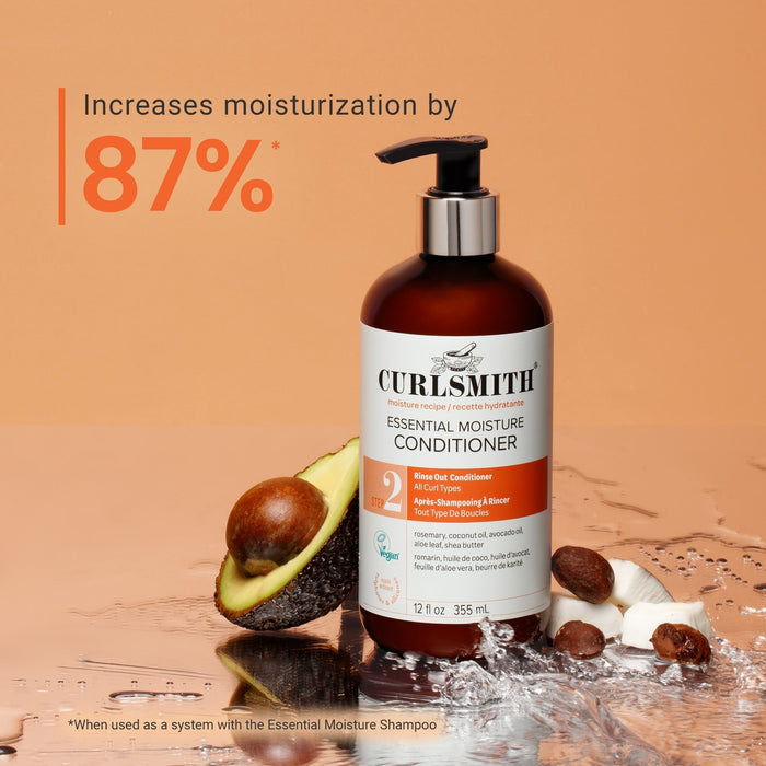 Curlsmith essential moisture conditioner bottle with avocado and almonds on a brown background