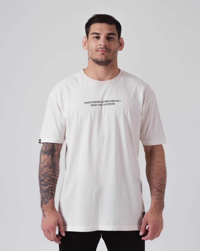 Kingz Est. 2011 Tee Cream - Front View Male Athlete Short Sleeve Cream Shirt Black Text Center Chest Minimalist Design Streetwear Casual Apparel [color:Cream]