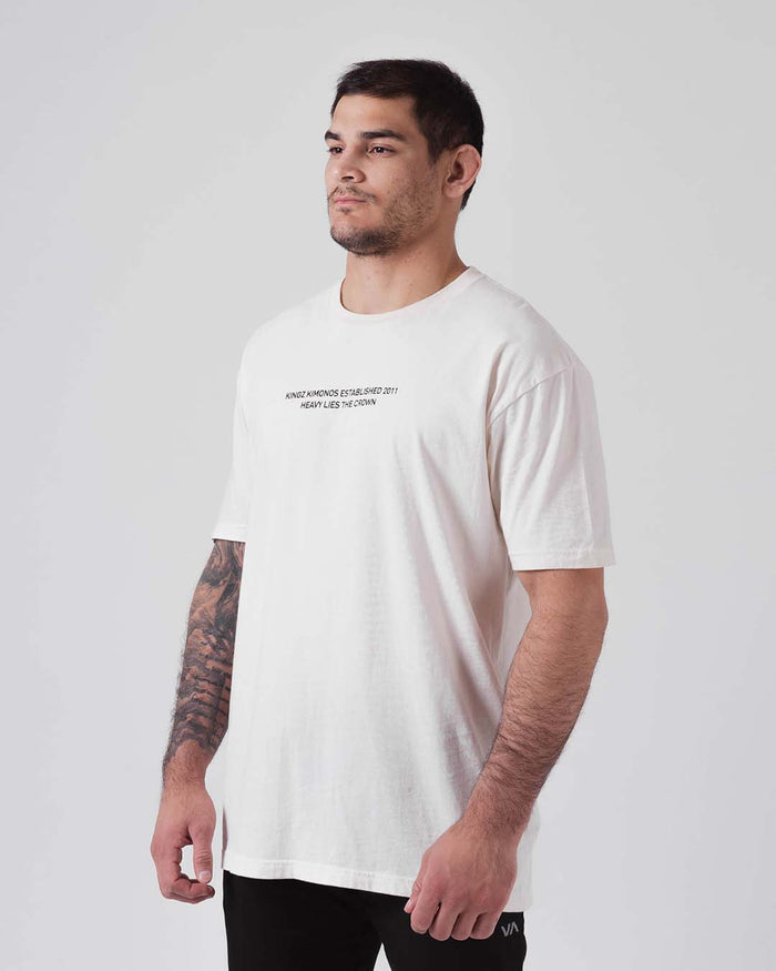 Kingz Est. 2011 Tee Cream - Side View Male Athlete Short Sleeve Cream Tee Black Text Center Chest Relaxed Fit Streetwear Casual BJJ Apparel [color:Cream]