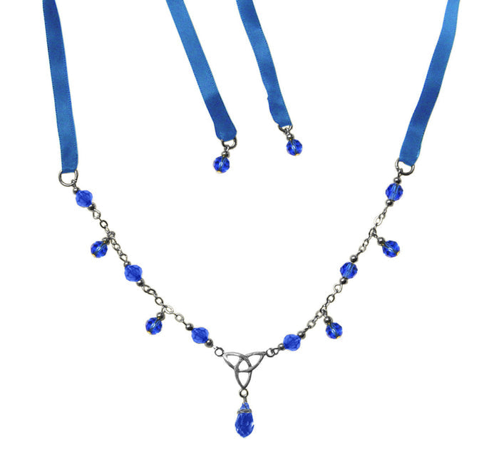 Silver triquetra knot ribbon tie crown necklace with blue crystal bead accents front view
