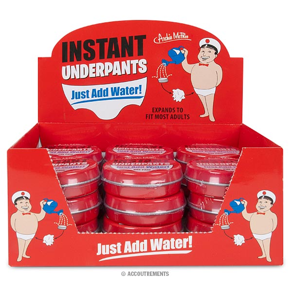 Red display box of Instant Underpants labeled "Just Add Water!" featuring a cartoon character pouring water.