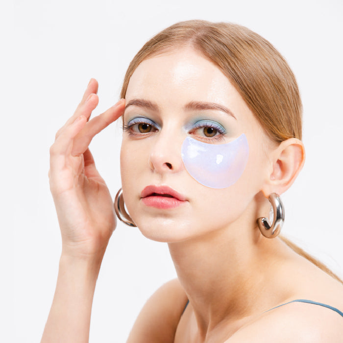 K-SECRET Instant Relief Eye Gel Patches with caffeine, showing the soothing eye patches on a model's under-eye area.