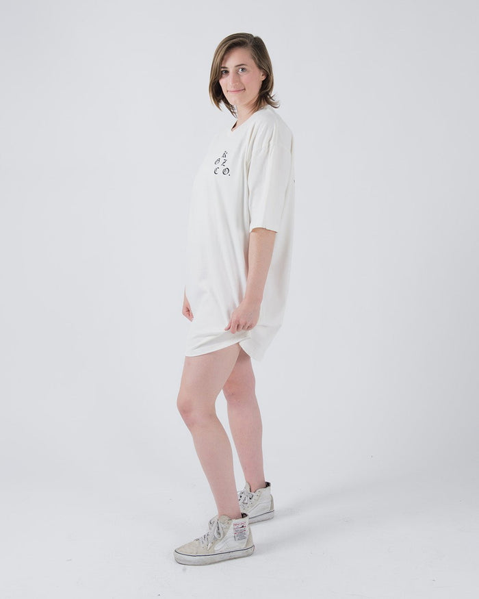 Kingz KGZ OE Tee Natural - Side View Female Model Oversized Fit Short Sleeve Black Graphic Center Chest Minimalist Design Streetwear [color:Natural]