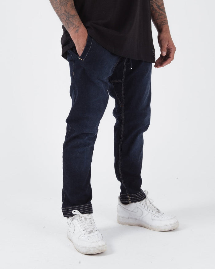 Kingz Casual Gi Pant - Denim - Front View Male Athlete Dark Denim Contrast Stitching Rolled Cuffs Relaxed Fit BJJ Gi [color:Denim]