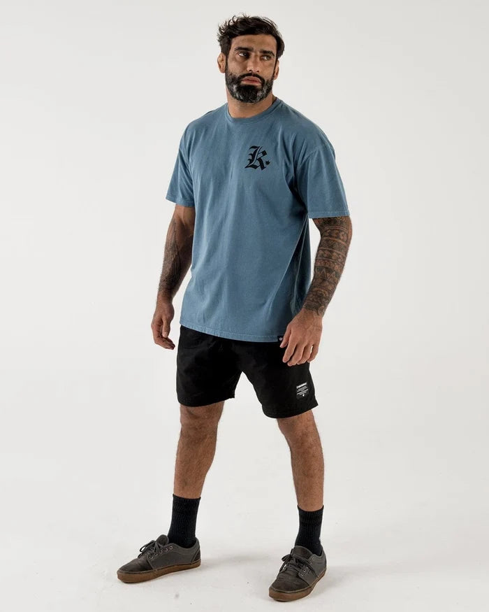 Kingz Casual Gi Shorts Black - Full Body Front View Male Athlete Black Shorts White Text Right Thigh Relaxed Fit Versatile Design Grappling Shorts BJJ Training [color:Black]