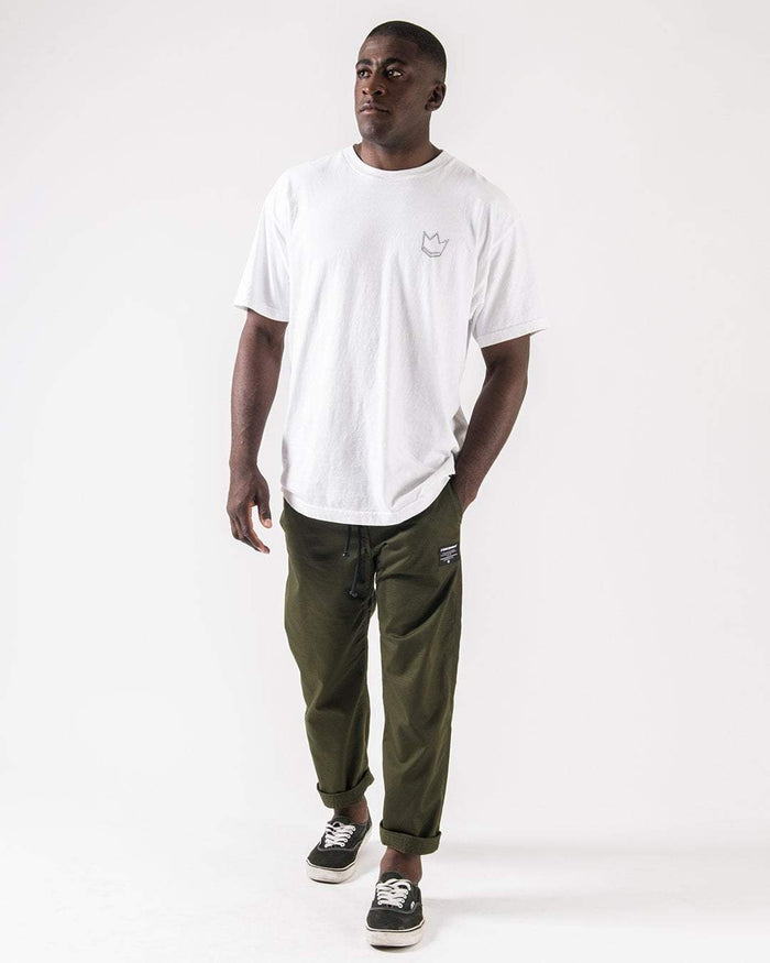 Kingz Casual Rip Stop Gi Pants - Military Green - Full Body Front View Male Athlete Rolled Cuffs Drawstring Waist Kingz Logo Patch Right Thigh Relaxed Fit BJJ Gi Training Pants [color:Military Green]