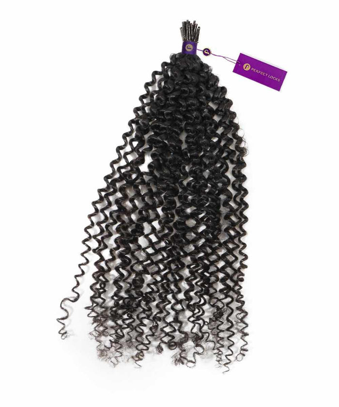 A bundle of tightly coiled dark brown to black synthetic hair extensions with a purple tag. Springy curls have frizzy ends.