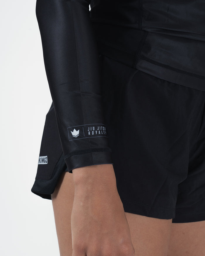 Kingz Kore V2 Long Sleeve Rashguard Black - Close Up Wrist Cuff Detail JIU JITSU ROYALTY Woven Label Crown Logo White Black Wrist Band KINGZ Shorts Side Text All Black Women's BJJ Kore V2 Premium Detail [color:Black]