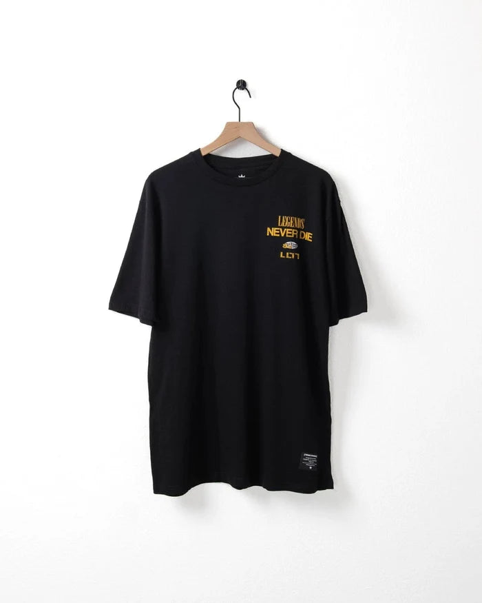 Kingz Legends Never Die Tee Black - Flat Lay Front View Yellow Legends Never Die Text Left Chest Small Logo Tag Bottom Hem Classic Fit T-Shirt BJJ Training Apparel [color:Black]