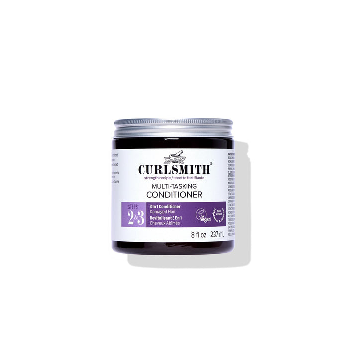 Jar of Curlsmith multi-tasking conditioner on a white background