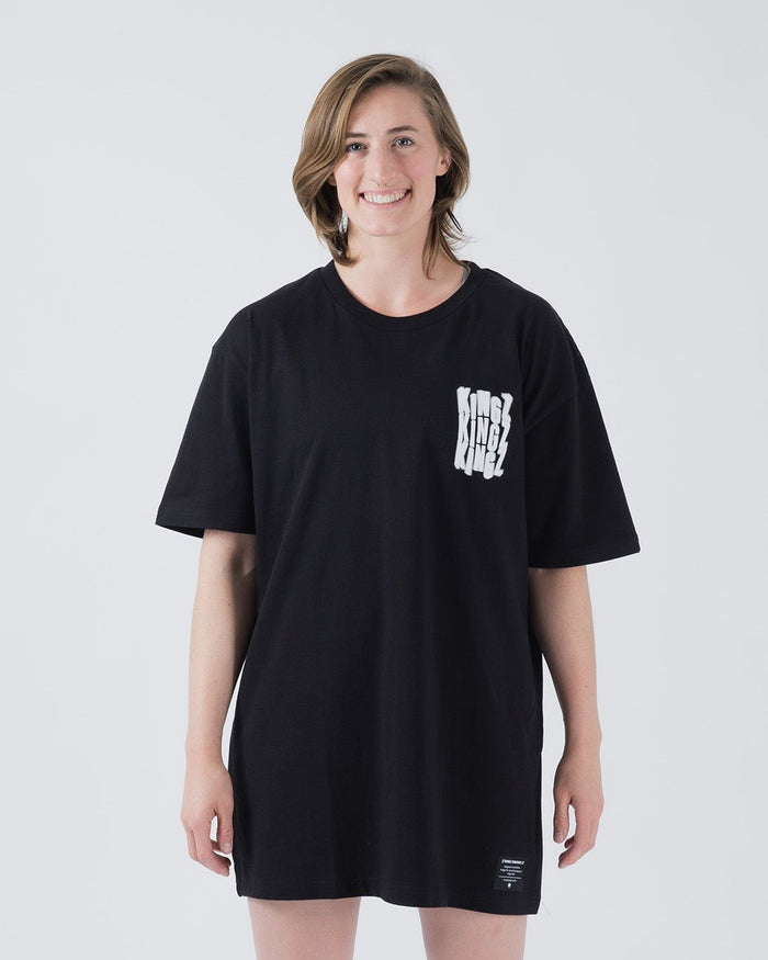 Kingz Quake Tee Black - Full Body Front View Female Model Oversized Fit White KINGZ Text Left Chest Black Cotton Streetwear Tee [color:Black]