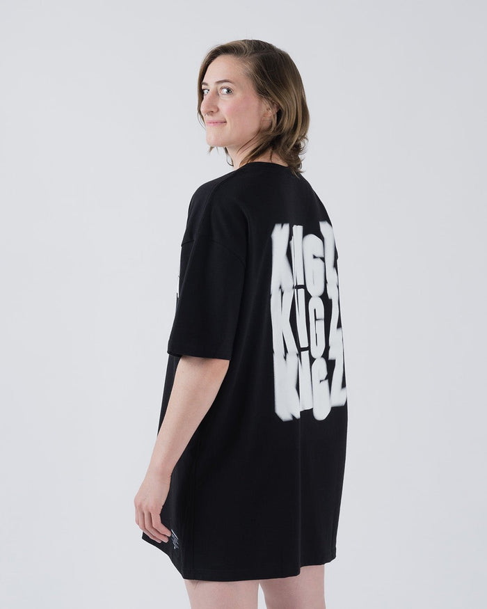 Kingz Quake Tee Black - Back View Female Model Oversized Fit Bold White KINGZ Text Back Streetwear Casual Apparel [color:Black]