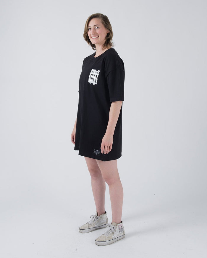 Kingz Quake Tee Black - Three Quarter View Female Model Oversized Fit White KINGZ Text Left Chest Minimalist Design Streetwear [color:Black]