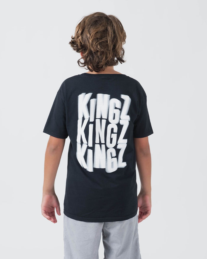 Kingz Quake Youth Tee Black - Back View Youth Model Black Tee Large White KINGZ Text Streetwear Casual Apparel [color:Black]