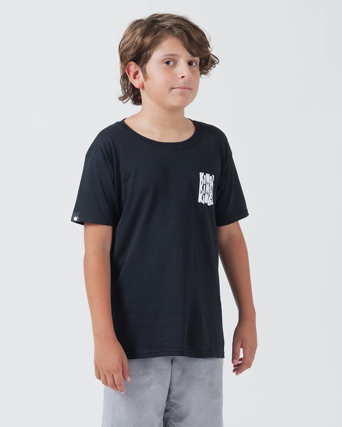 Kingz Quake Youth Tee Black - Front View Young Male Black Tee Vertical KINGZ Text Left Chest Small Crown Sleeve Streetwear [color:Black]