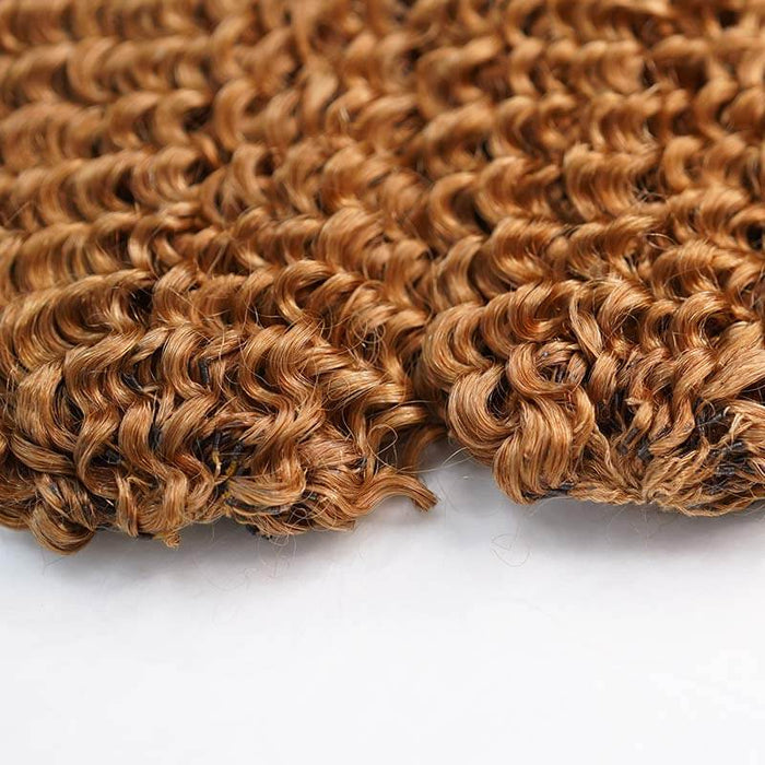ends of honey blonde water wave crochet braids