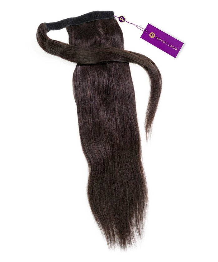 A Relaxed Straight Clip-In Ponytail Extension in natural black by Perfect Locks sits on white with a purple Perfect Locks tag.#color_natural-black-(1B)