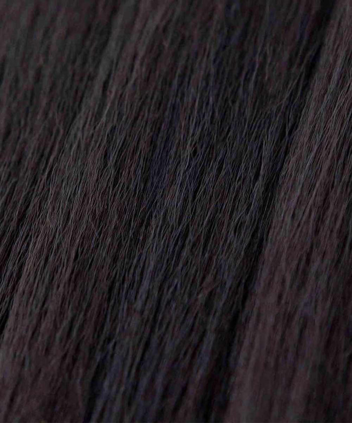 Close-up view of straight, dark brown hair with subtle hints of black and a fine, glossy texture, highlighting individual strands and natural shine.