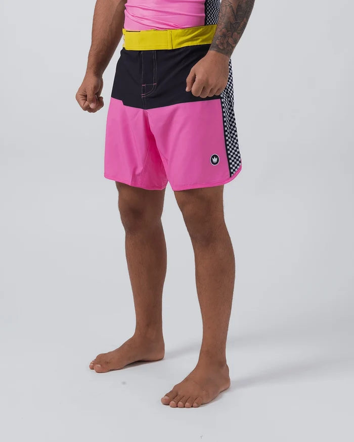 Kingz Retro Shorts Hot Pink Black Yellow - Full Body Left Side Profile Male Athlete Color Block Grappling Shorts Black White Checkerboard Side Panel Crown Logo Right Outer Thigh Yellow Elastic Waistband Pink Rashguard Bare Feet Men's No-Gi BJJ Retro Collection [color:Hot Pink/Retro]