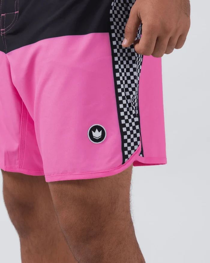 Kingz Retro Shorts Hot Pink Black Yellow - Close Up Right Hip Detail Crown Logo White on Black Circle Emblem Hot Pink Panel Black White Checkerboard Side Insert Pink Contrast Stitching Black Upper Panel Hand Gripping Waistband Men's No-Gi BJJ Retro Collection [color:Hot Pink/Retro]