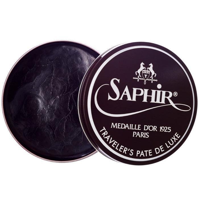 A black tin of Saphir Traveler's Pate de Luxe Wax Shoe Polish by KirbyAllison.com.