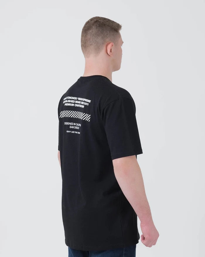Kingz Slant Bar Tee Black - Back View Male Athlete White Text Graphic Upper Back Striped Bar Design Relaxed Fit Short Sleeve Casual T-Shirt BJJ Training Apparel [color:Black]