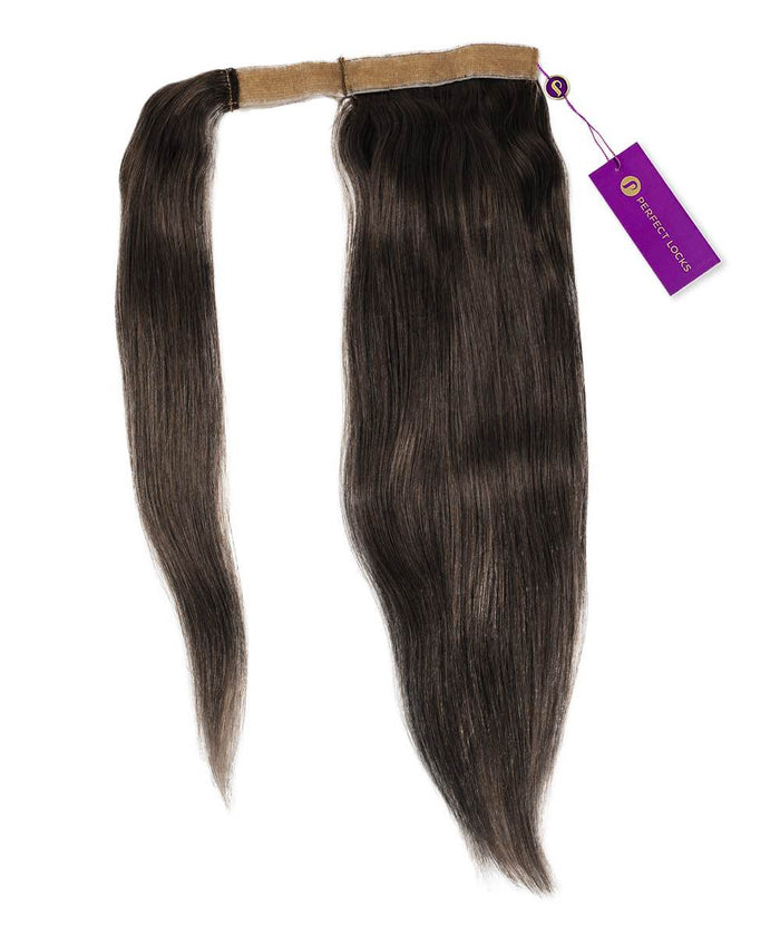 The Straight Clip-In Ponytail Extensions from Perfect Locks in Natural Black  have long, straight Remy hair, a tan band at the top, and a purple tag on one end.#color_natural-black-(1B)