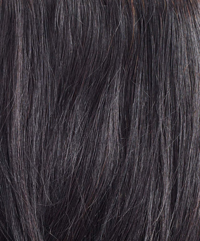 Close-up of dark brown hair with gray strands shows texture and shine—ideal for blending with Perfect Locks Straight Virgin Hand-Tied Weft extensions.