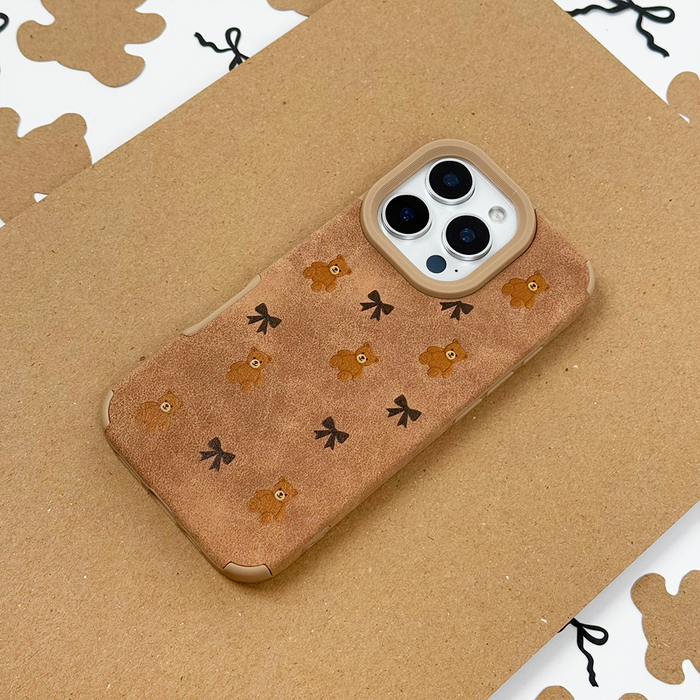 Brown suedette phone case with small bear and paw print pattern.