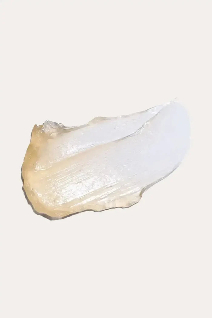 The Doux Push It! Edge Gel Texture Swatch - Close-up of Super-Charged Honey Braid & Edge Gel Formula, Smooth Creamy Consistency for Perfect Edge Control