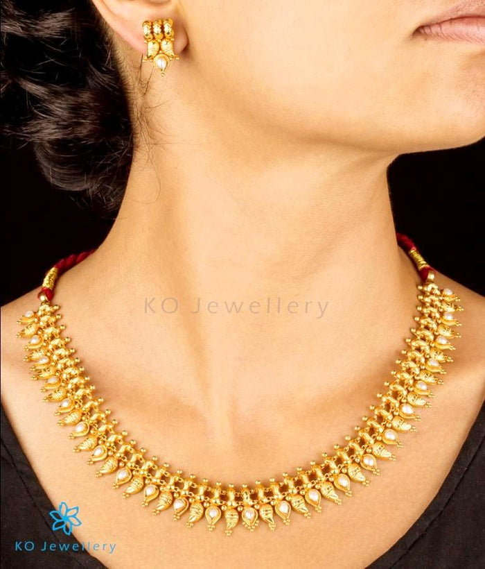 The Sampada Silver Paisley Pearl Necklace Set
