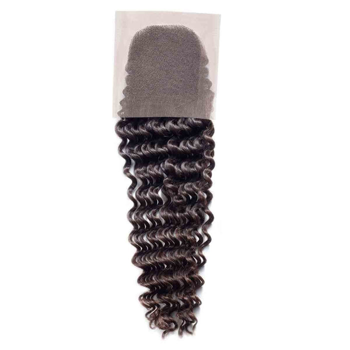 A lace closure hairpiece with loose, defined dark brown curls in a neat pattern for seamless, natural-looking extensions or wigs.