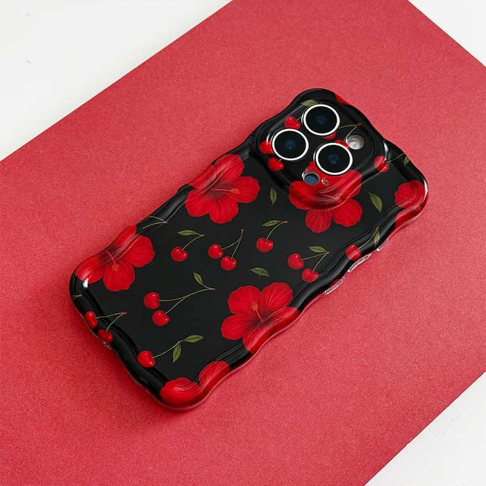 Red and white wavy phone case with red flowers and cherry illustrations, Coconut Lane Cherry Hibiscus design.