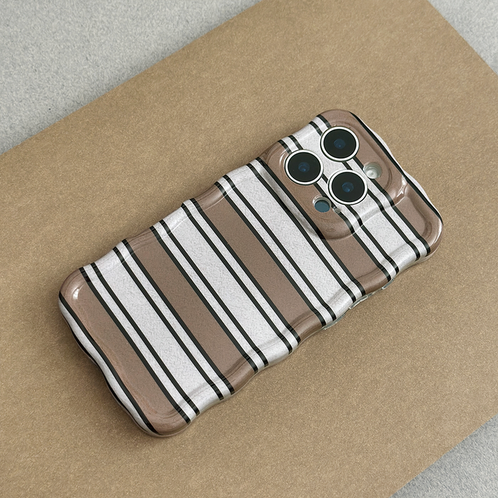 Brown and white wavy striped phone case by Coconut Lane on a tan and gray background.
